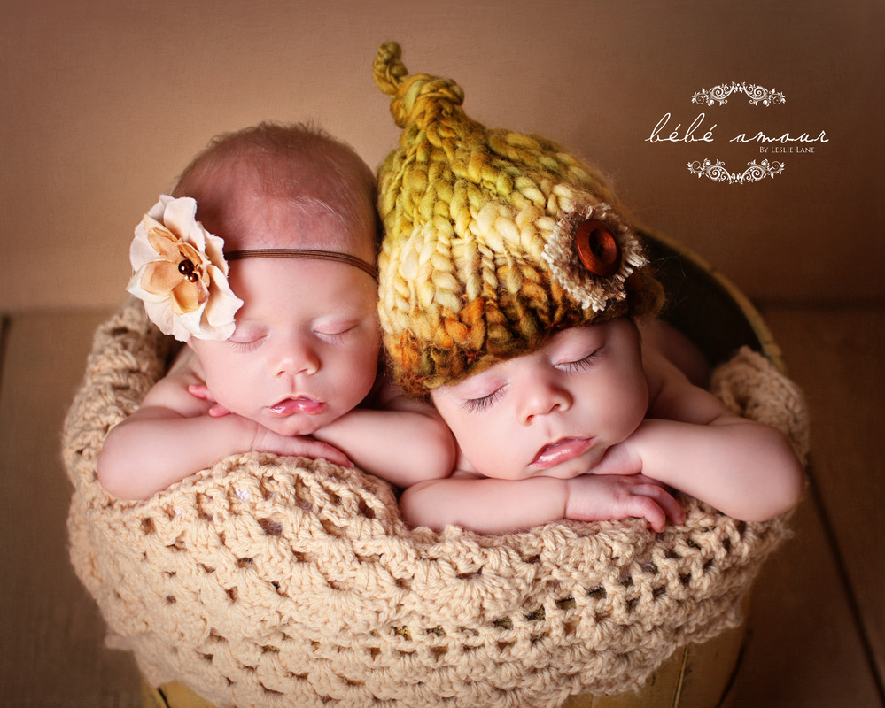 newborn twins in yellow